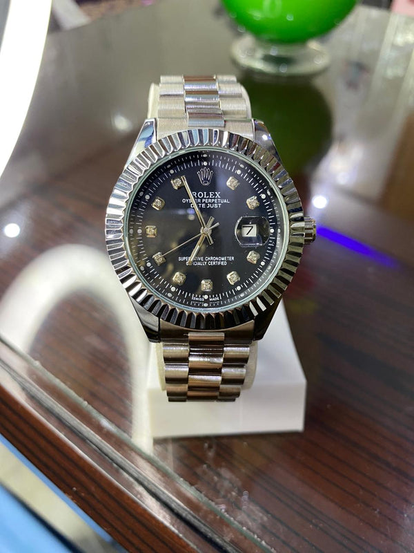 Rolex watch black dial and silver steel change and date working and original Rolex lock
